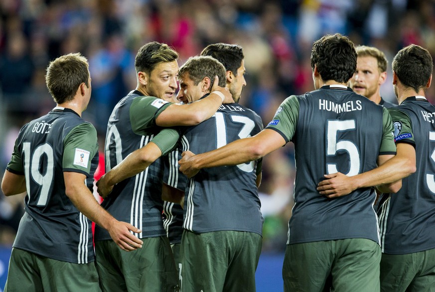 Germany&#039;s Thomas Muller, center, celebrates with teammates after scoring against Norway during their World Cup Group C qualifying soccer match in Oslo, Sunday, Sept. 4, 2016. (Vegard Wivestad Gro ...