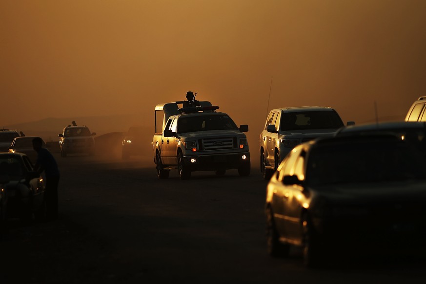 Kämpfer der irakisch-kurdischen Peshmerga-Milizen auf dem Weg nach Mosul und in den Kampf gegen die ISIS-Extremisten.