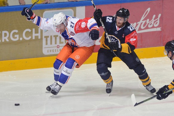 Tappara&#039;s player Martin Roymark, left, and Lugano&#039;s player Stefan Ulmer, right, during the Champions Hockey League Group C hockey match between Switzerland&#039;s HC Lugano and Finland&#039; ...