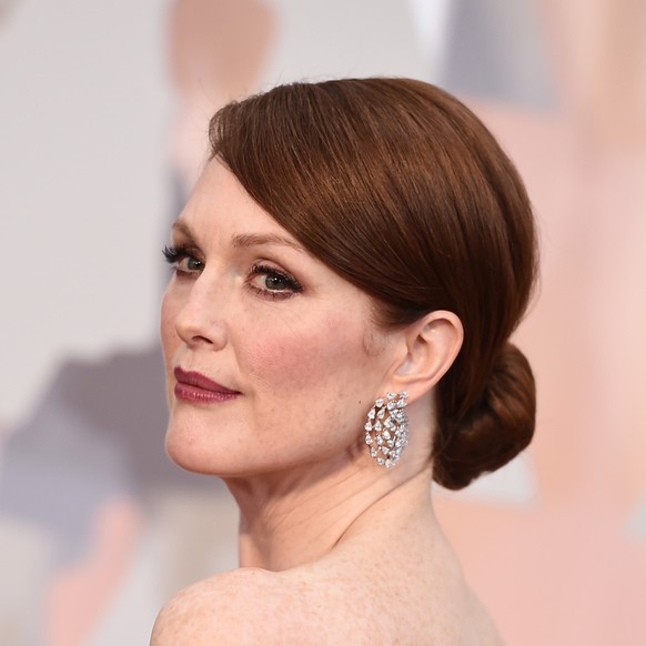 Julianne Moore arrives at the Oscars on Sunday, Feb. 22, 2015, at the Dolby Theatre in Los Angeles. (Photo by Jordan Strauss/Invision/AP)