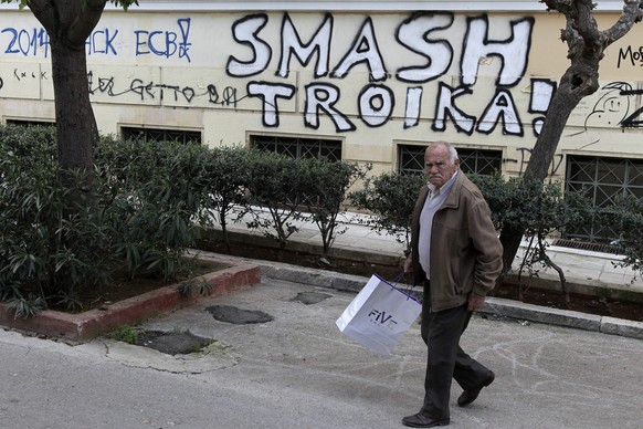 Graffito in Athen gegen die ungeliebte Troika.