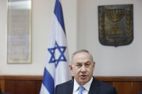 Israeli Prime Minister Benjamin Netanyahu attends the weekly cabinet meeting in Jerusalem, Sunday, April 23, 2017. (Ronen Zvulun/ Pool via AP)