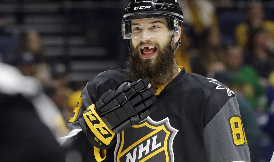 FILE - In this Sunday, Jan. 31, 2016, file photo, Pacific Division defenseman Brent Burns (88), of the San Jose Sharks, talks with a referee during the NHL hockey All-Star championship game in Nashvil ...