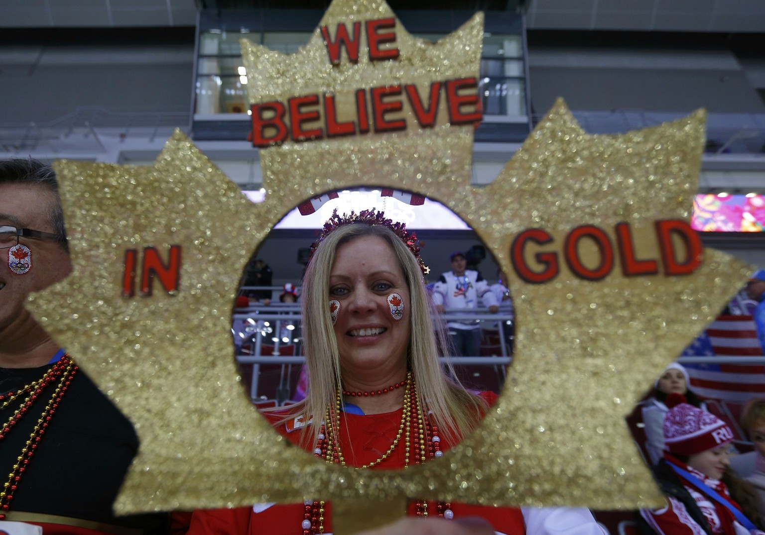 A Canada fan holds up a sign as she attends the women&#039;s ice hockey final game between Canada and Team USA at the Sochi 2014 Winter Olympic Games February 20, 2014. REUTERS/Laszlo Balogh (RUSSIA - ...