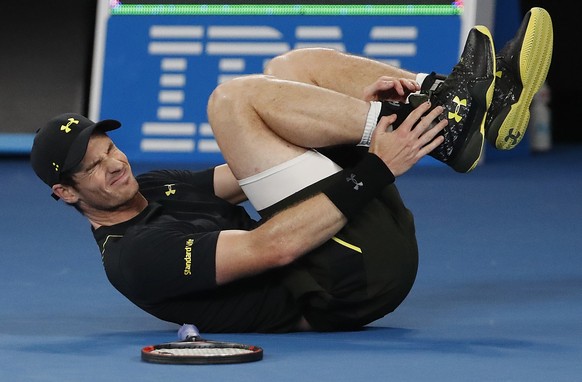 Britain&#039;s Andy Murray reacts as he falls during his second round match against Russia&#039;s Andrey Rublev at the Australian Open tennis championships in Melbourne, Australia, Wednesday, Jan. 18, ...
