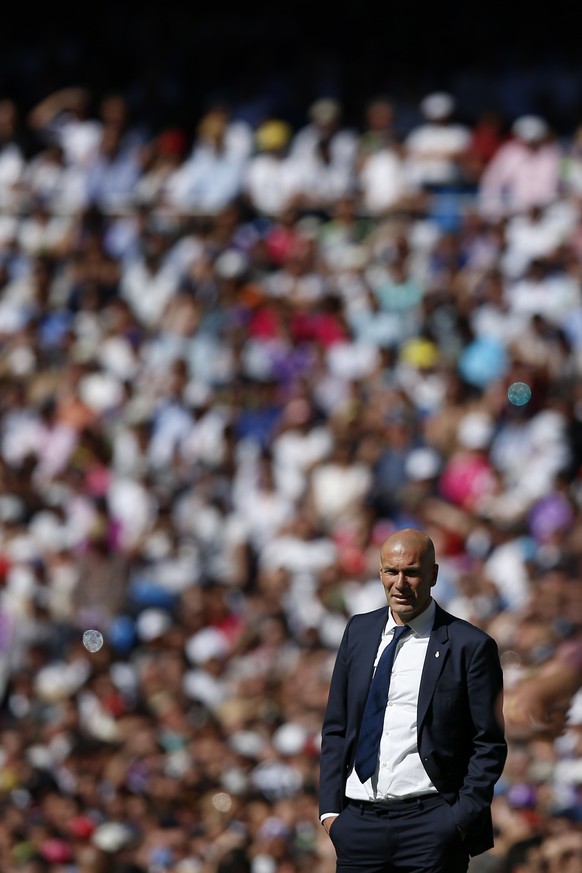 Real Madrid&#039;s head coach Zinedine Zidane looks on during a Spain&#039;s La Liga soccer match between Real Madrid and Alaves at the Santiago Bernabeu stadium in Madrid, Spain, Saturday, April 8, 2 ...