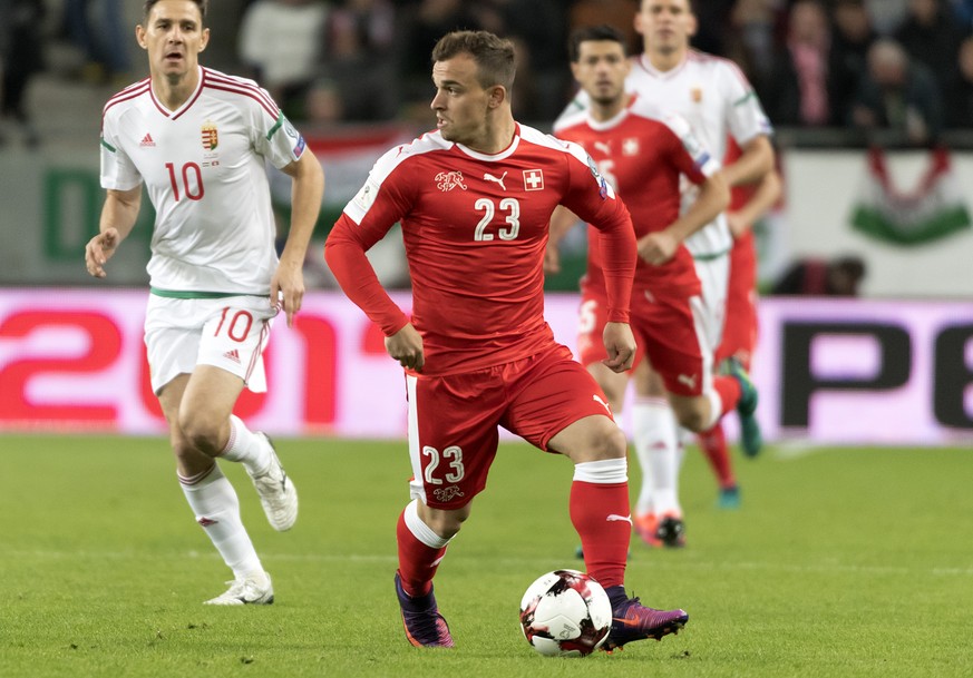 Switzerland&#039;s Xherdan Shaqiri, right, in action during the 2018 Fifa World Cup Russia group B qualification soccer match between Hungary and Switzerland in the Groupama Arena in Budapest, Hungary ...