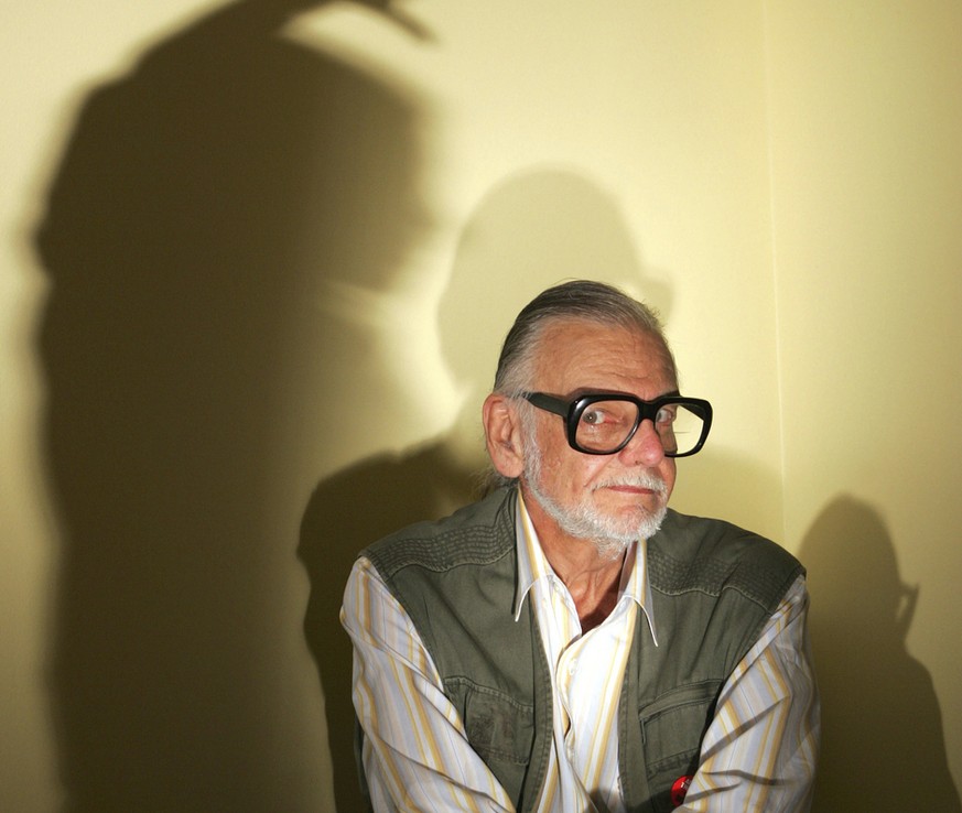Zombie-movie master George Romero, director of &quot;Night of the Living Dead,&quot; &quot;Dawn of the Dead,&quot; Day of the Dead,&quot; and his latest film &quot;Land of the Dead,&quot; poses with s ...