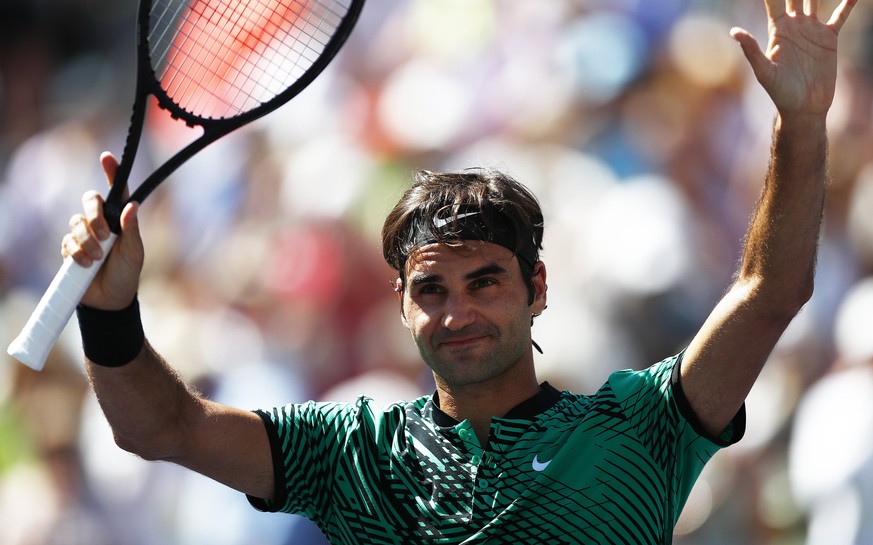 epa05857129 Roger Federer of Switzerland reacts after winning against Jack Sock of United States during their semi finals match at the 2017 BNP Paribas Open tennis tournament at the Indian Wells Tenni ...