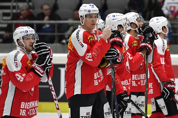 Switzerland&#039;s Lino Martschini, left, and Reto Schaeppi react after the game between Switzerland and Germany during the Ice Hockey Deutschland Cup at the Curt-Frenzel-Eisstadion in Augsburg, Germa ...