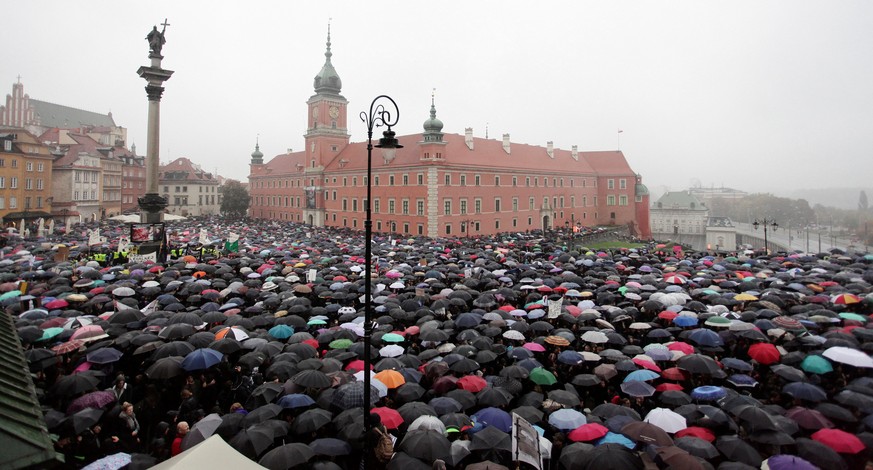 Thousands of people gather during an abortion rights campaigners&#039; demonstration to protest against plans for a total ban on abortion in front of the Royal Castle in Warsaw, Poland October 3, 2016 ...
