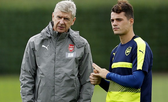 Britain Soccer Football - Arsenal Training - Arsenal Training Ground - 27/9/16
Arsenal manager Arsene Wenger and Granit Xhaka during training
Action Images via Reuters / Andrew Couldridge
Livepic
 ...