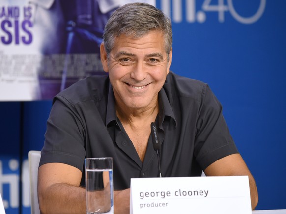 George Clooney attends a press conference for &quot;Our Brand is Crisis&quot; on Day 3 of the Toronto International Film Festival at the TIFF Bell Lightbox on Saturday, Sept. 12, 2015, in Toronto. (Ph ...