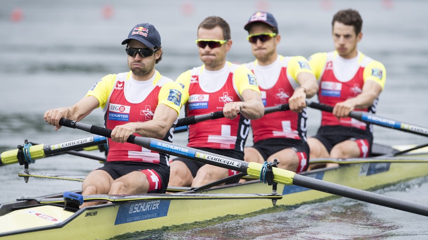 Mario Gyr, Simon Niepmann, Simon Schuerch and Lucas Tramer, from left, from Switzerland at the Men&#039;s Lightwight Four Final race at the Rowing World Cup on Lake Rotsee in Lucerne, Switzerland, Sun ...