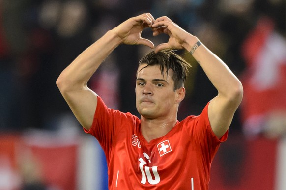 Swiss forward Granit Xhaka, celebrates after the second goal during the UEFA EURO 2016 group E qualifying football match Switzerland against Estonia at the Swissporarena in Lucerne, Switzerland, Frida ...