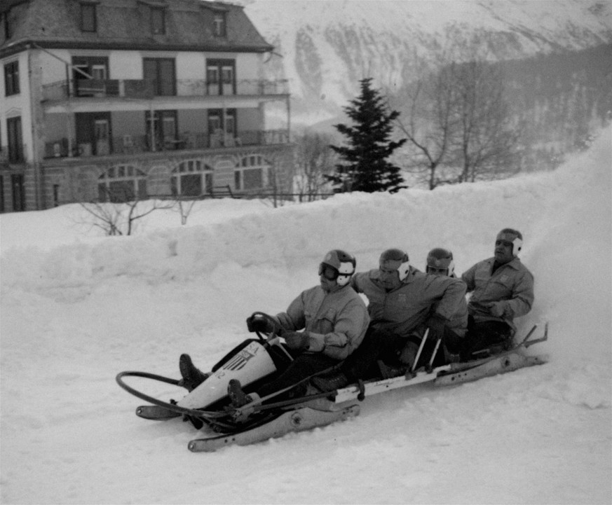 The U.S. four-man bobsled team, gold medal winner of the Olympic championship, is shown February 6, 1948 at St. Moritz, Switzerland. Left to right: Francis Tyler, Lake Placid, NY, pilot; Pat Martin, M ...