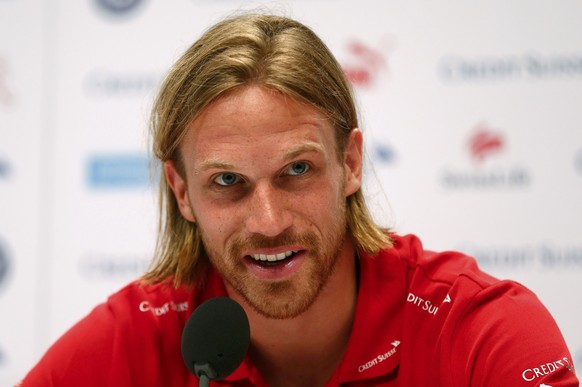 Switzerland&#039;s national soccer team player Michael Lang addresses a news conference in Porto Seguro June 29, 2014. REUTERS/Arnd Wiegmann (BRAZIL - Tags: SOCCER SPORT WORLD CUP HEADSHOT)