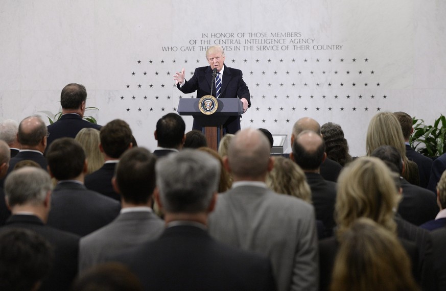 epa05740016 US President Donald J. Trump speaks to 300 people at the CIA headquarters, in Langley, Virginia, USA, 21 January 2017. EPA/Olivier Douliery / POOL