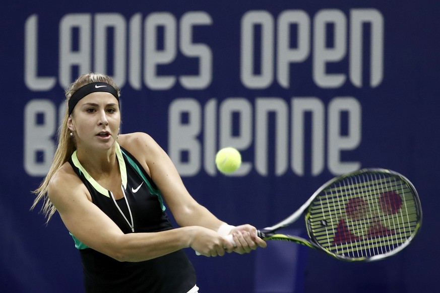 Belinda Bencic of Switzerland returns a ball to Carina Witthoeft of Germany during their first round match, at the WTA Ladies Open tennis tournament in Biel, Switzerland, Tuesday, April 11, 2017. (KEY ...