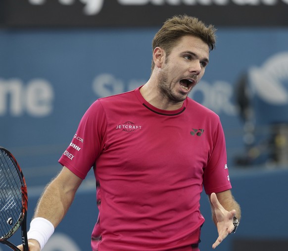 Stan Wawrinka of Switzerland reacts after missing a point in his semi final match against Kei Nishikori of Japan at the Brisbane International tennis tournament in Brisbane, Australia, Saturday, Jan.  ...