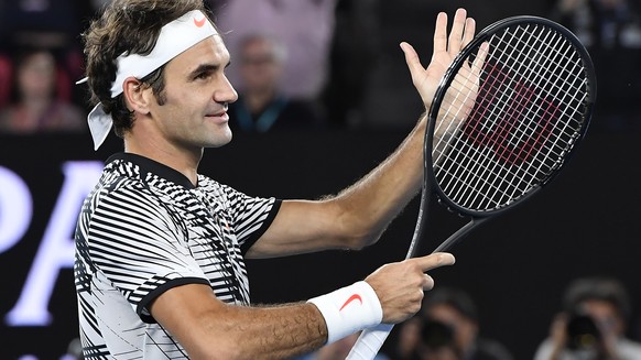 Switzerland&#039;s Roger Federer celebrates after defeating Germany&#039;s Mischa Zverev during their quarterfinal at the Australian Open tennis championships in Melbourne, Australia, Tuesday, Jan. 24 ...