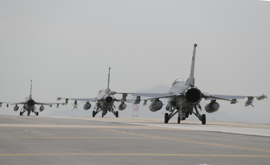 epa05916396 F16 fighters of the USA Air Force are seen on the runway during a Seventh Air Force and the 8th Fighter Wing host exercise Max Thunder at the eighth Fighter Wing in Gunsan, South Korea, 20 ...
