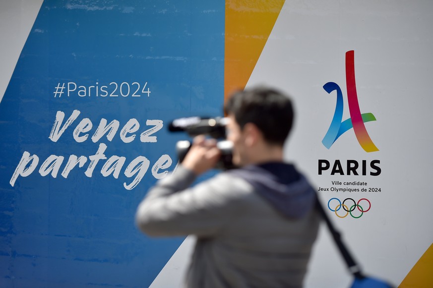 epa06119015 (FILE) - Members of the media tour the Jean Bouin stadium as the International Olympic Committee (IOC) Evaluation Commission visit, as Paris bids to host the 2024 Summer Olympic Games, Par ...