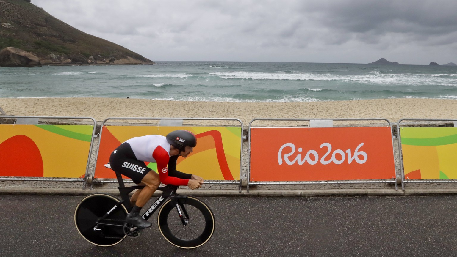 Cyclist Fabian Cancellara of Switzerland rides along Pontal beach during the men&#039;s individual time trial event at the 2016 Summer Olympics in Pontal beach, Rio de Janeiro, Brazil, Wednesday, Aug. ...