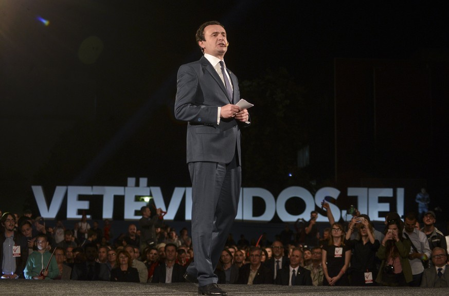 epa06020045 Albin Kurti, parliamentary elections Prime Minister candidate and founder of the biggest opposition party Self-determination (Vetevendosje) holds a speech during the closing election rally ...