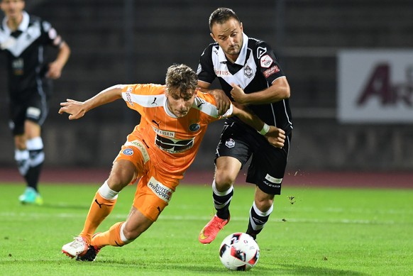 Lugano&#039;s player Davide Mariani, right, fights for the ball with Grasshopper&#039;s player Numa Lavanchy left, during the Super League soccer match FC Lugano against FC Grasshopper Club Zurich, at ...