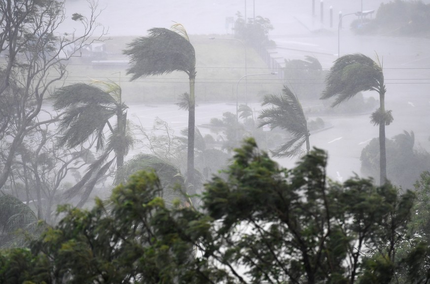 epa05874366 Strong winds and rain lash Airlie Beach, Australia, 28 March 2017. Reports state that Cyclone Debbie is expected to hit Queensland&#039;s far north coast as a category 4 cyclone early afte ...