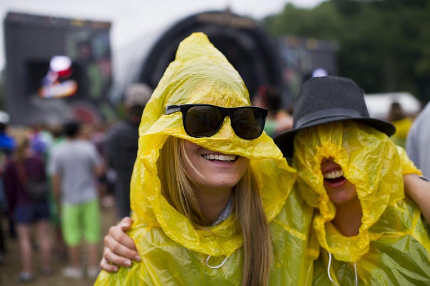 Festival visitors enjoy the concert of Swiss rapper Stress during the Openair St. Gallen Festival in St. Gallen, Switzerland, Sunday, July 1, 2012. The OpenAir St. Gallen runs from June 28 to July 1, ...