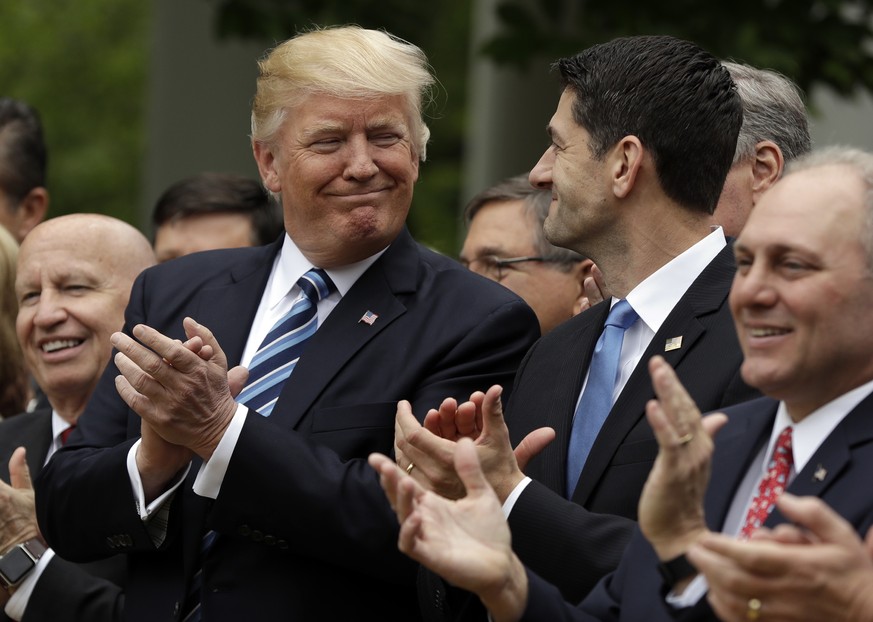 President Donald Trump talks with House Speaker Paul Ryan of Wis., in the Rose Garden of the White House in Washington, Thursday, May 4, 2017, after the House pushed through a health care bill. House  ...