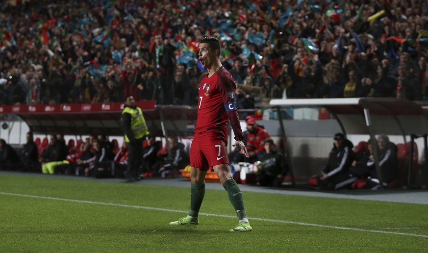 Portugal&#039;s Cristiano Ronaldo celebrates after scoring a goal during the World Cup Group B qualifying soccer match between Portugal and Hungary at the Luz stadium in Lisbon Saturday, March 25 2017 ...