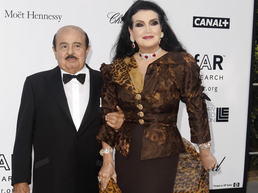 Adnan Kashoggi and his wife Lamia arrive at the amfAR&#039;s annual Cinema Against AIDS 2008 gala at Le Moulin de Mougins, southern France, Thursday, May 22, 2008.