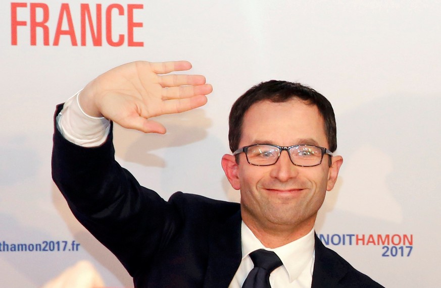 Former French minister Benoit Hamon reacts after the results in the first round of the French left&#039;s presidential primary election in Paris, France, January 22, 2017. REUTERS/Jacky Naegelen TPX I ...