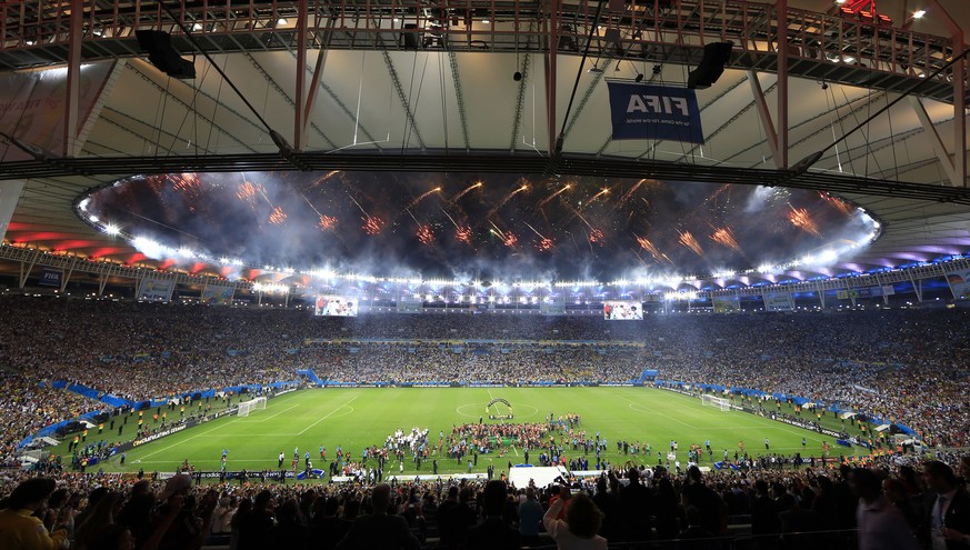 FILE - In this July 13, 2014 file photo, fireworks explode over the Maracana Stadium after the World Cup final match between Germany and Argentina at the Maracana Stadium in Rio de Janeiro, Brazil. Ge ...