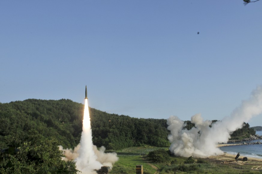 epa06066634 A handout photo made available by the United States Forces Korea (USFK) and the 8th Army shows missiles being fired during US-South Korean joint Precision Firing Capability exercise along  ...