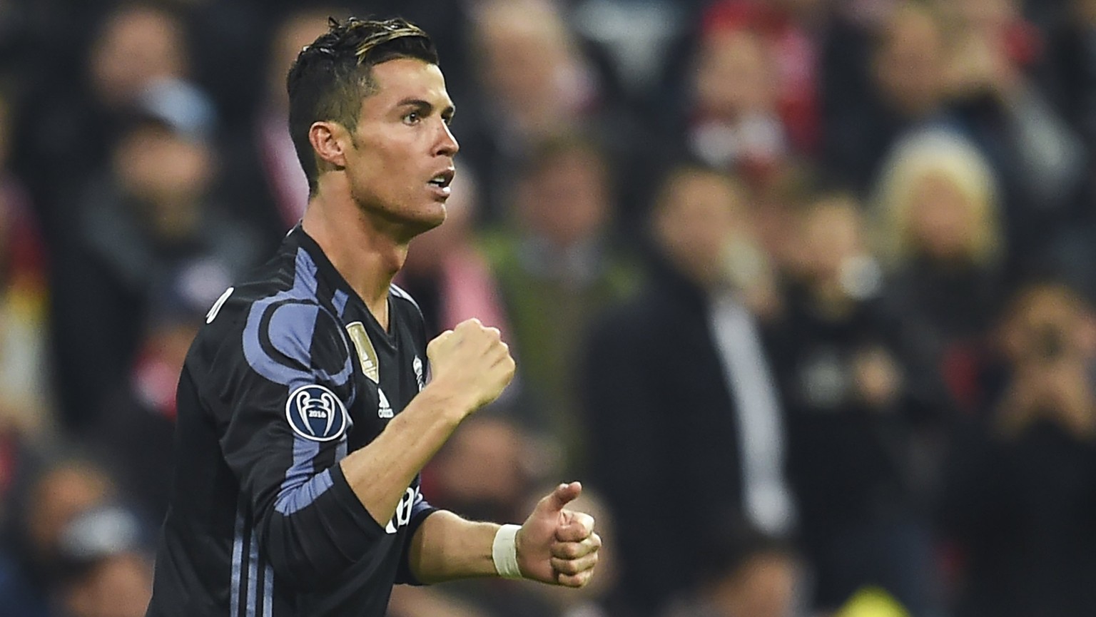 epa05905069 Real Madrid&#039;s Cristiano Ronaldo celebrates after scoring the 1-1 equalizer during the UEFA Champions League quarter final, first leg soccer match between FC Bayern Munich and Real Mad ...