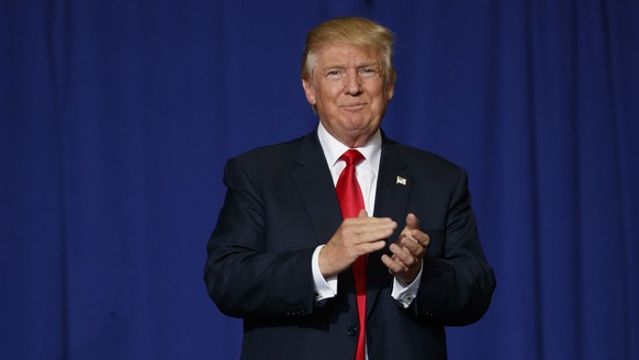 Republican presidential candidate Donald Trump arrives to speak to a campaign rally, Thursday, Oct. 27, 2016, in Geneva, Ohio. (AP Photo/ Evan Vucci)