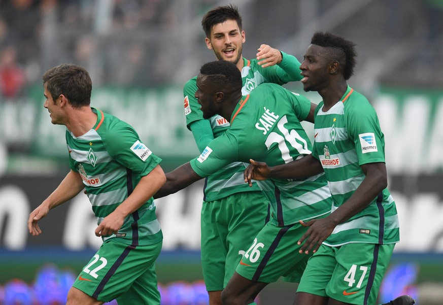 epa05565357 Bremen&#039;s Ludovic Lamine Sane (C) celebrates his 1-1 goal with Ousman Manneh (R) and teammates during the German Bundesliga soccer match between Darmstadt 98 and Werder Bremen at the J ...