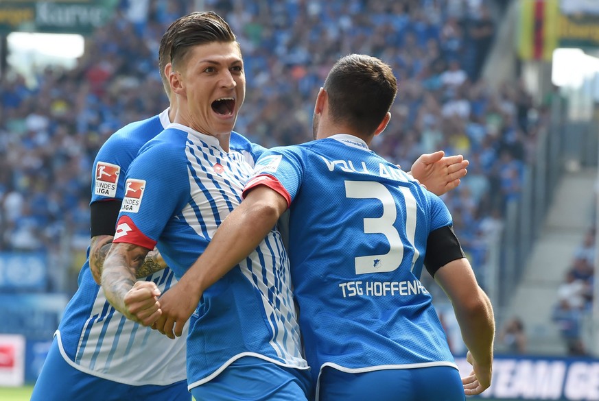 epa04892982 Hoffenheim&#039;s Steven Zuber (L) and Kevin Volland celebrate 1-0 goal by Volland during the German Bundesliga soccer match between TSG 1899 Hoffenheim and FC Bayern Munich at the Wirsol  ...