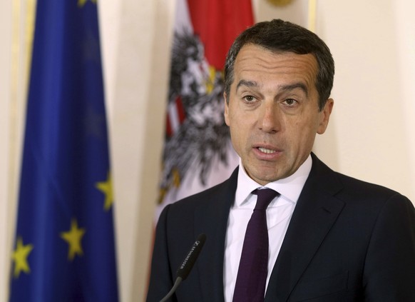 Austrian Chancellor Christian Kern, right, speaks to the media at the federal chancellery in Vienna, Austria, Wednesday, May 9, 2017, after Vice Chancellor Reinhold Mitterlehner fromt the conservative ...