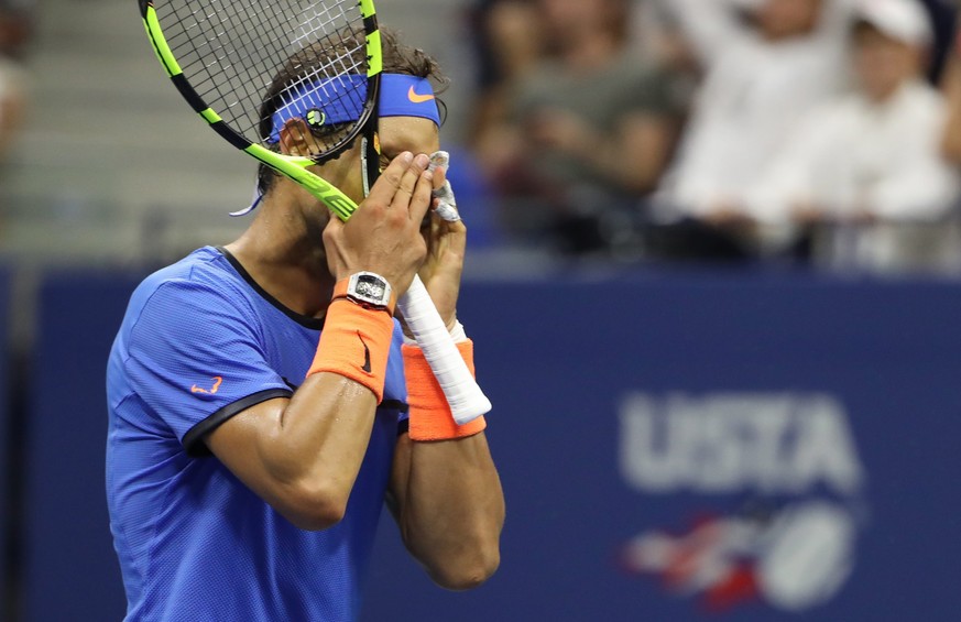 epa05524748 Rafael Nadal of Spain reacts after a point against Lucas Pouille of France on the seventh day of the US Open Tennis Championships at the USTA National Tennis Center in Flushing Meadows, Ne ...