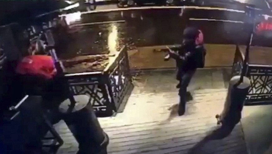 epa05722411 (FILE) - A file picture dated 01 January 2017 shows a video capture of the gunman entering the Reina nightclub, a popular night club in Istanbul near by the Bosphorus, in Istanbul, Turkey, ...