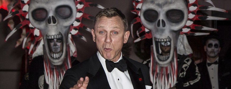Daniel Craig poses for photographers upon arrival at the James Bond Spectre party in London, Monday, Oct. 26, 2015. (Photo by Vianney Le Caer/Invision/AP)