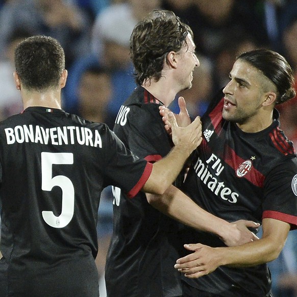 AC Milan&#039;s Ricardo Rodriguez celebrates after scoring a goal, during the Europa League third qualifying round, first leg, soccer match between AC Milan and Universitatea Craiova, in the Municipal ...