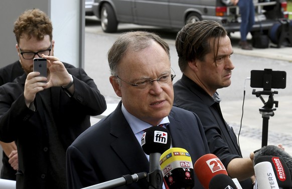 Lower Saxony&#039;s state Governor Stephan Weil of the Social Democrats, SPD, talks to media in front of the state chancellery in Hannover, Germany, Aug. 4, 2014. The center-left governor of one of Ge ...