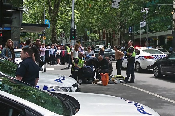 epaselect epa05732808 Police and emergency services at the scene after a car is believed to have hit pedestrians in Bourke Street Mall in Melbourne, Victoria, Australia, 20 January 2017. Ambulance Vic ...