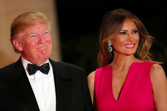 U.S. President Donald Trump and First Lady Melania Trump attend the 60th Annual Red Cross Gala at Mar-a-Lago club in Palm Beach, Florida, U.S., February 4, 2017. REUTERS/Carlos Barria TPX IMAGES OF TH ...